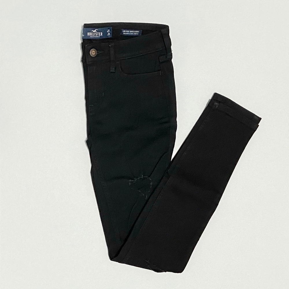 black ripped hollister jeans